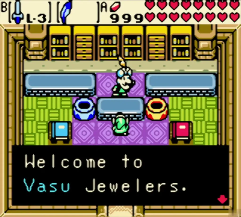 Vasu behind his shop counter at Vasu Jewelers, the box reading "Welcome to Vasu Jewelers." Vasu behind his shop counter at Vasu Jewelers, the box reading "Welcome to Vasu Jewelers."