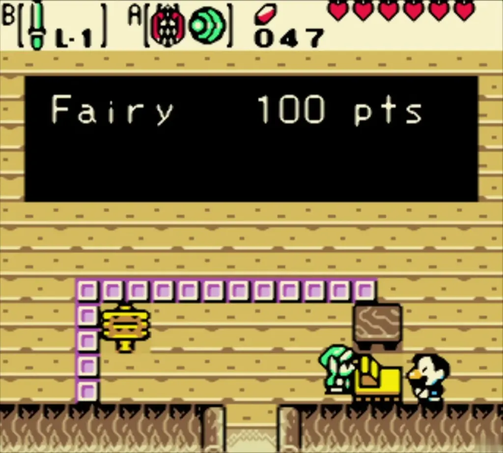 The attendant explaining that Fairy targets are worth 100 points The attendant explaining that Fairy targets are worth 100 points