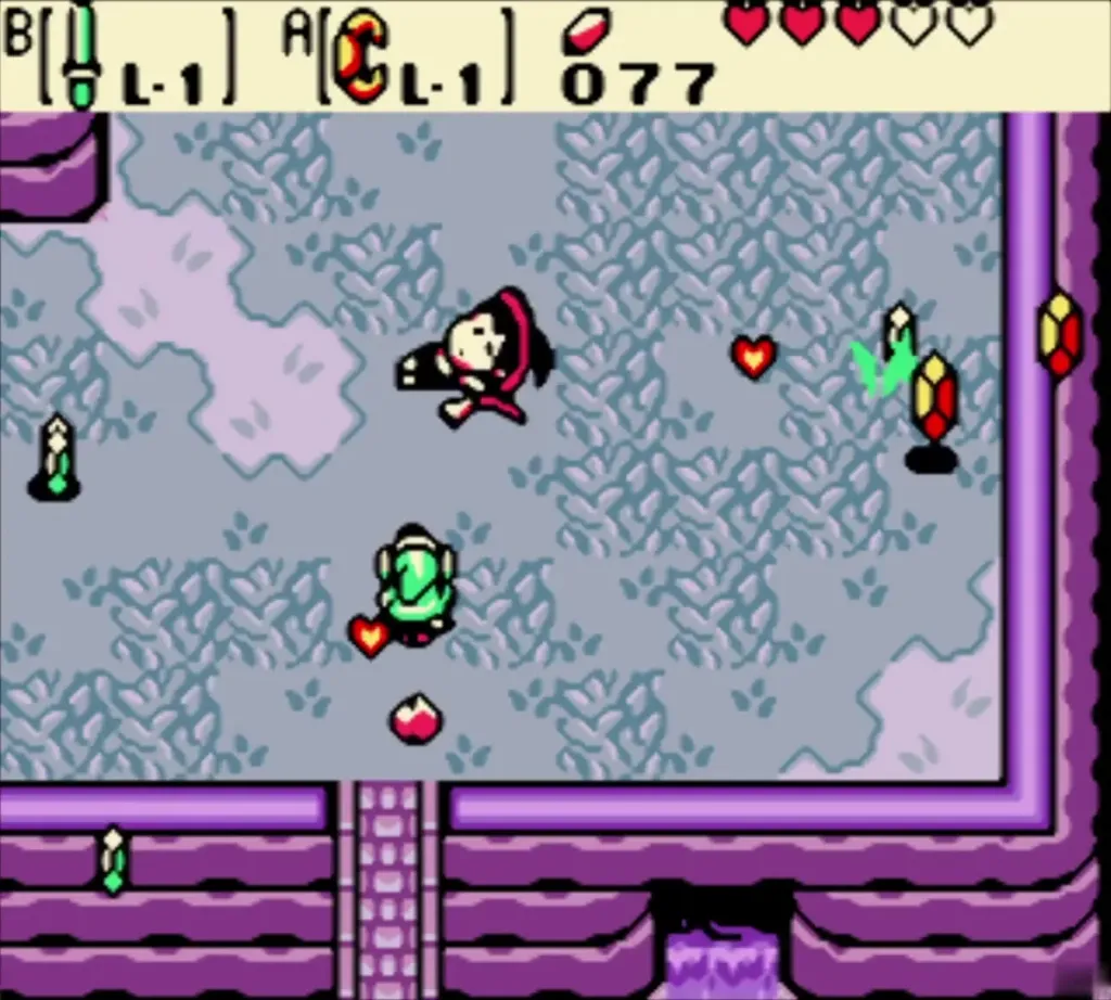 Maple the witch crashing into Link with hearts and rupees bouncing Maple the witch crashing into Link with hearts and rupees bouncing