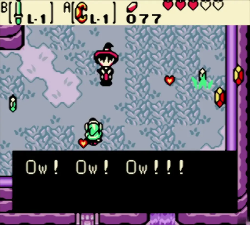 Maple standing up and yelling Ow with hearts and rupees scattered Maple standing up and yelling Ow with hearts and rupees scattered