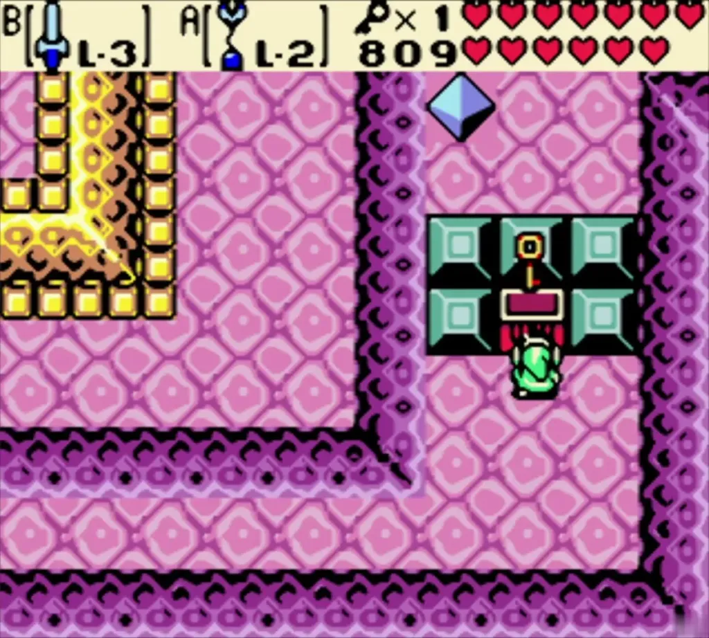 Chest with a key sign above it, inside its block border, in a pink room, before opening