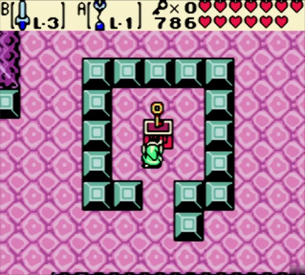 Chest with a small key inside a teal block border in a pink room of Jabu-Jabu's Belly