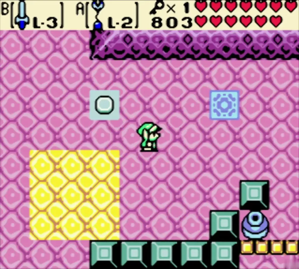 Blue pad, grey button and yellow sand floor in a pink room of Jabu-Jabu's Belly