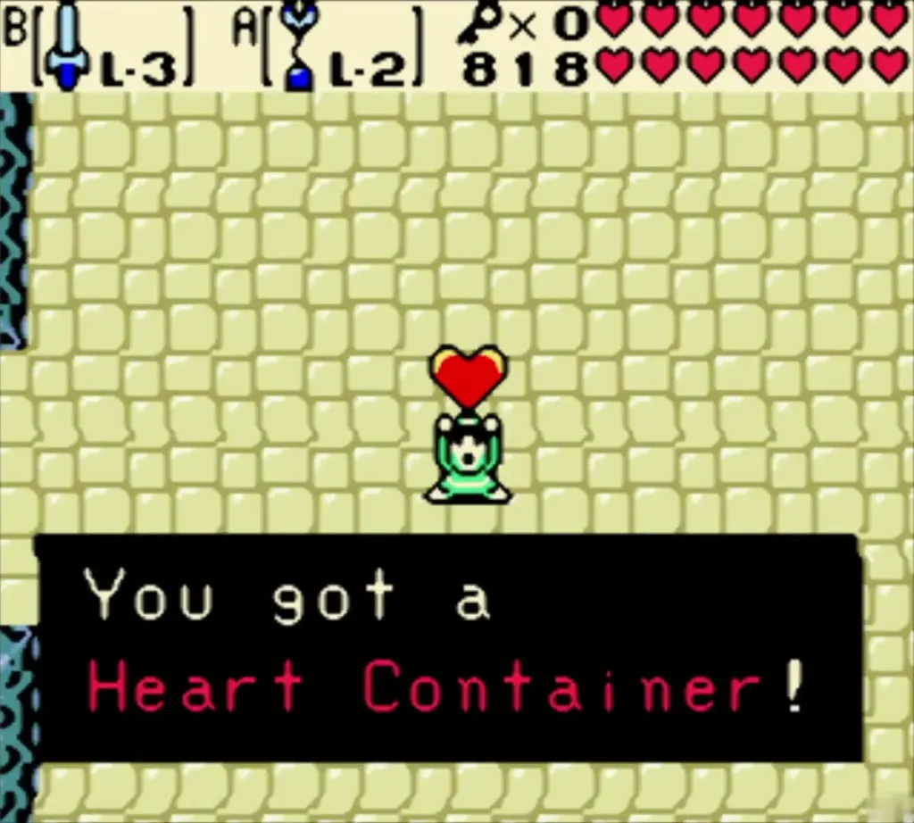 Link holding a Heart Container overhead with the You got a Heart Container message