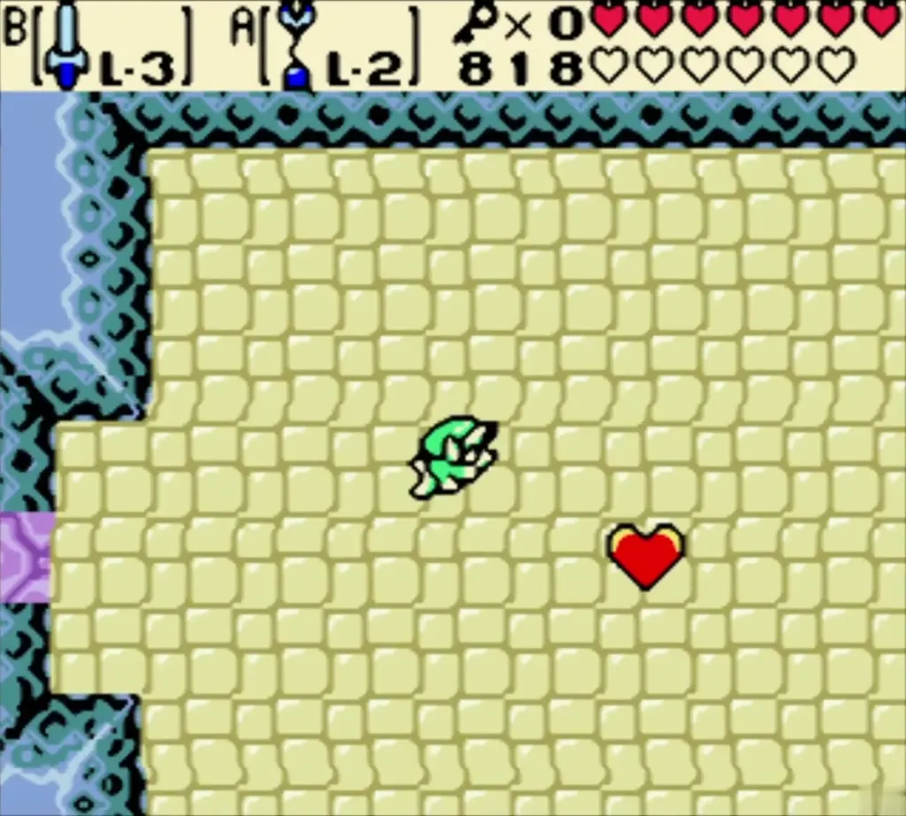 A heart dropped on the sand floor after the boss falls in Jabu-Jabu's Belly