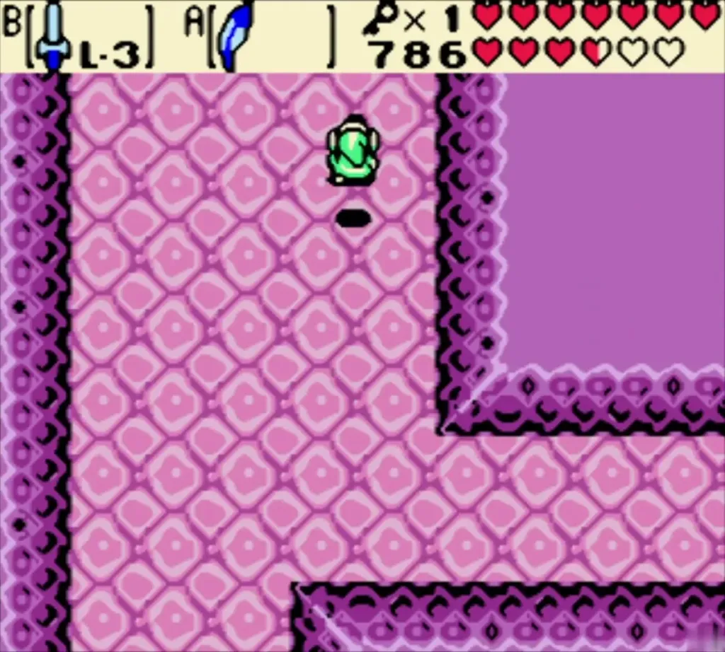 Green enemy beside a dark hole in a pink room of Jabu-Jabu's Belly