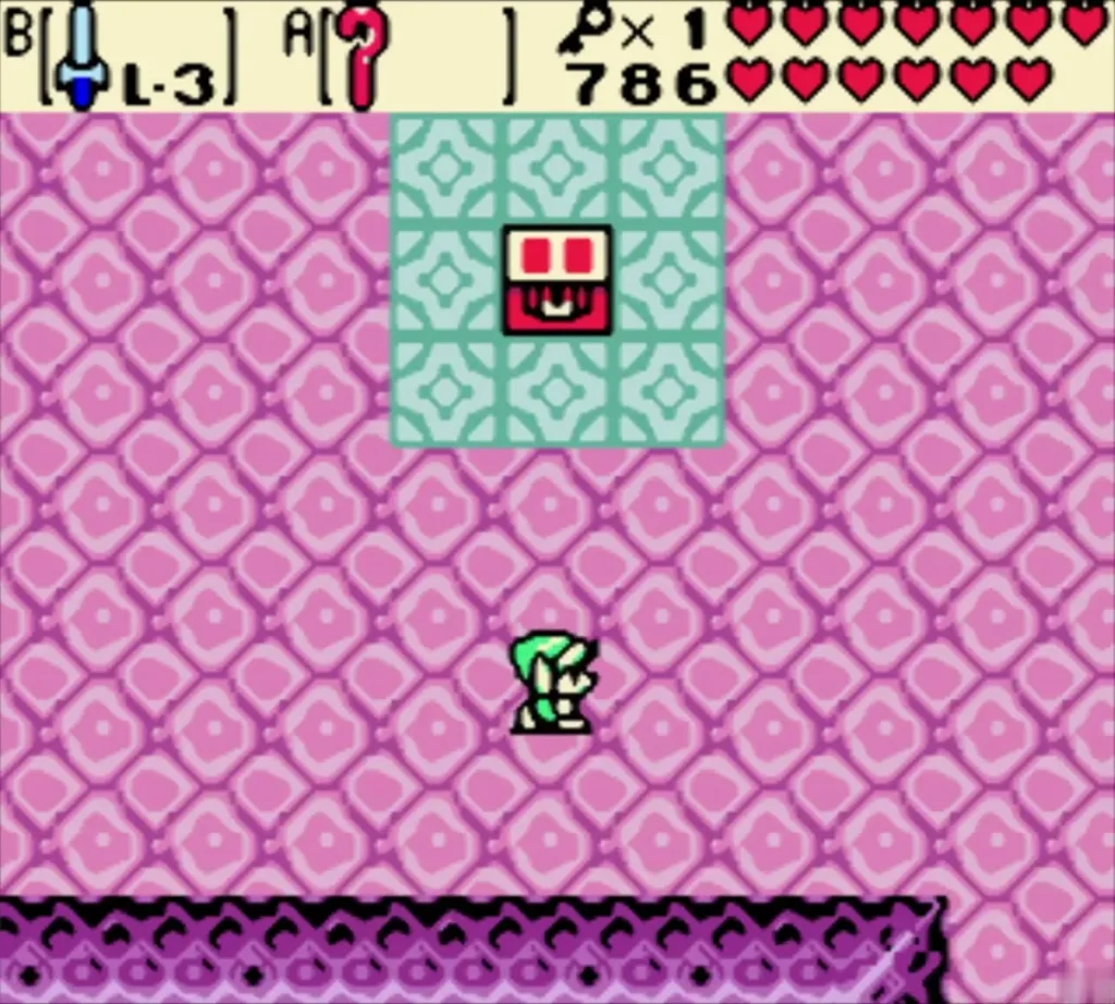 Red chest on a teal tile pad in a pink room of Jabu-Jabu's Belly with Link below it