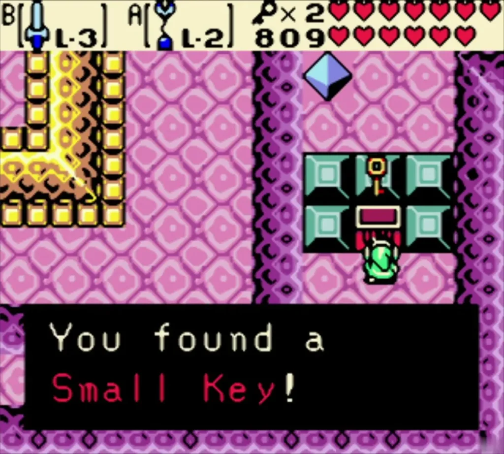 You found a Small Key message with Link beside the block-framed chest