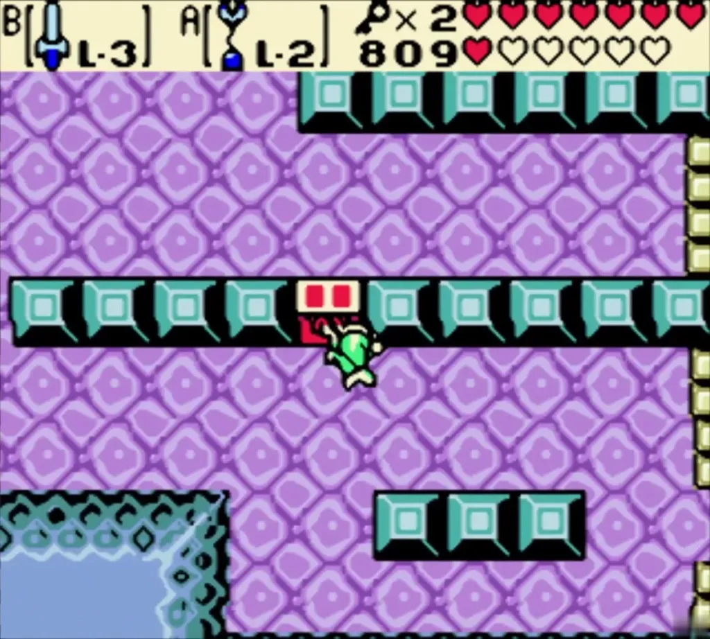 Link beside a chest in the teal block row of a lilac room in Jabu-Jabu's Belly