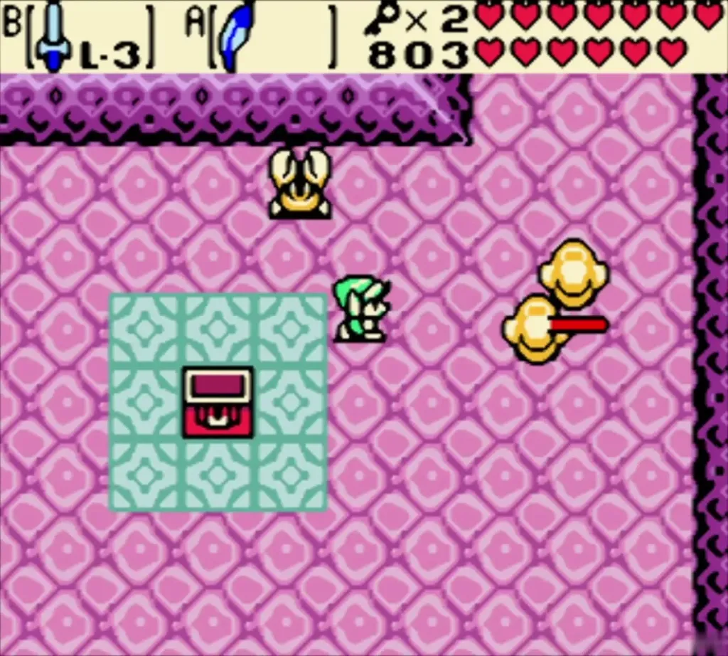 Link beside a chest on a teal pad with gold drops and a crab-like enemy nearby