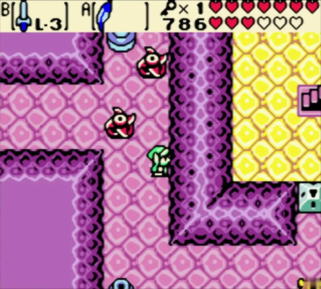 Link among red Zol-like enemies and a green snake in a pink room