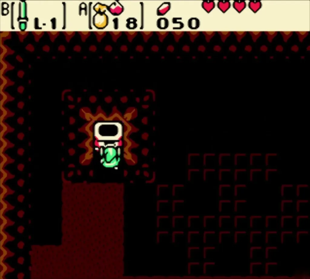 Link on the stairs below the lamp in the dark cave Link on the stairs below the lamp in the dark cave