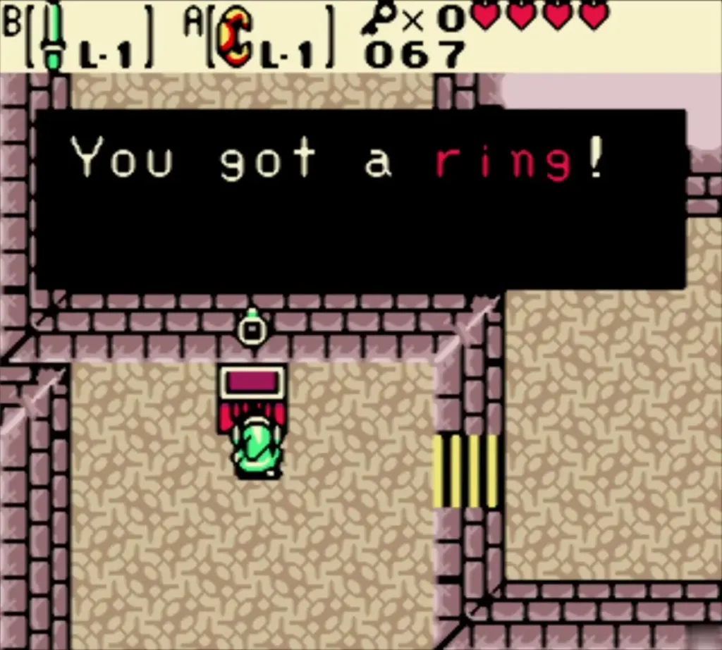 Link holding up a ring from the chest with the You got a ring message Link holding up a ring from the chest with the You got a ring message