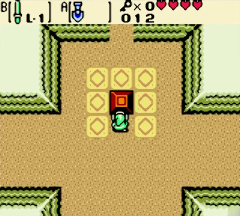 Link pushing a block among yellow floor tiles in the first Maku Path room Link pushing a block among yellow floor tiles in the first Maku Path room