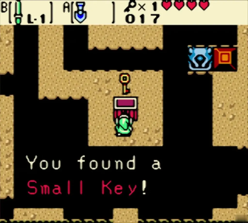 Link holding up the Small Key with the You found a Small Key message Link holding up the Small Key with the You found a Small Key message