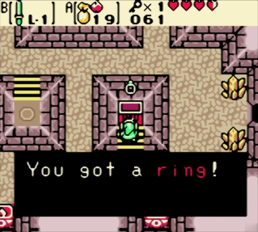 Link holding up a ring with the You got a ring message on the platform Link holding up a ring with the You got a ring message on the platform