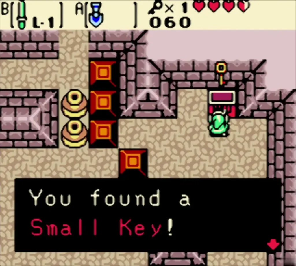 Link holding up a Small Key with the You found a Small Key message Link holding up a Small Key with the You found a Small Key message