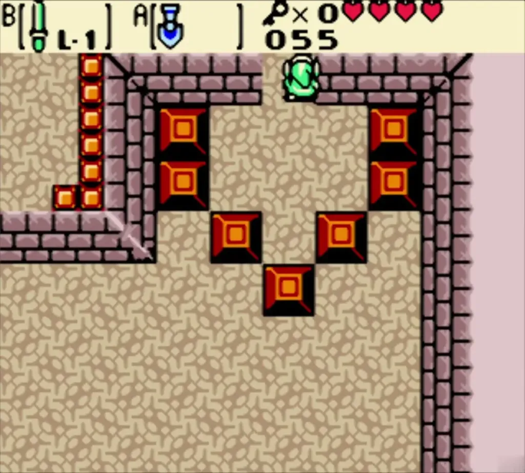 Link in a room with red blocks arranged in a V below the map chest ledge Link in a room with red blocks arranged in a V below the map chest ledge