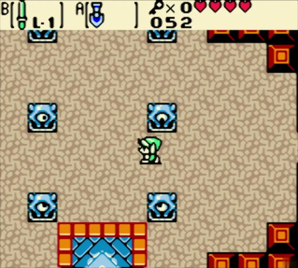 Link in the first Spirit's Grave room with blue eye statues Link in the first Spirit's Grave room with blue eye statues