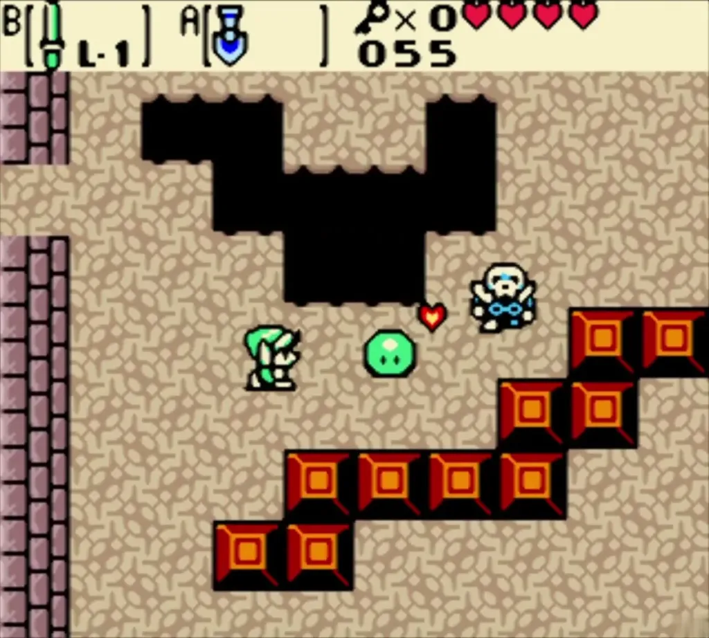 Link facing a Gel and a Stalfos beside a diagonal wall of red blocks Link facing a Gel and a Stalfos beside a diagonal wall of red blocks