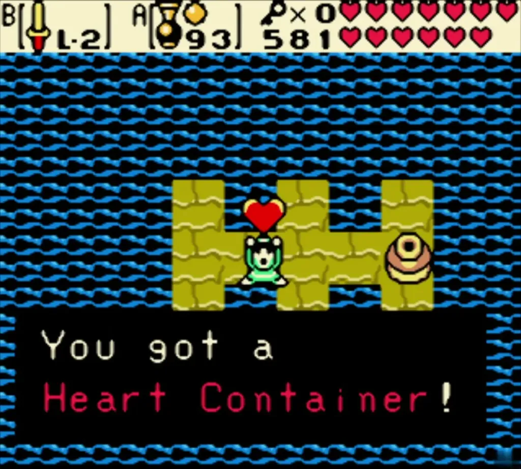Link holding up the Heart Container, with the box reading You got a Heart Container! Link holding up the Heart Container, with the box reading You got a Heart Container!