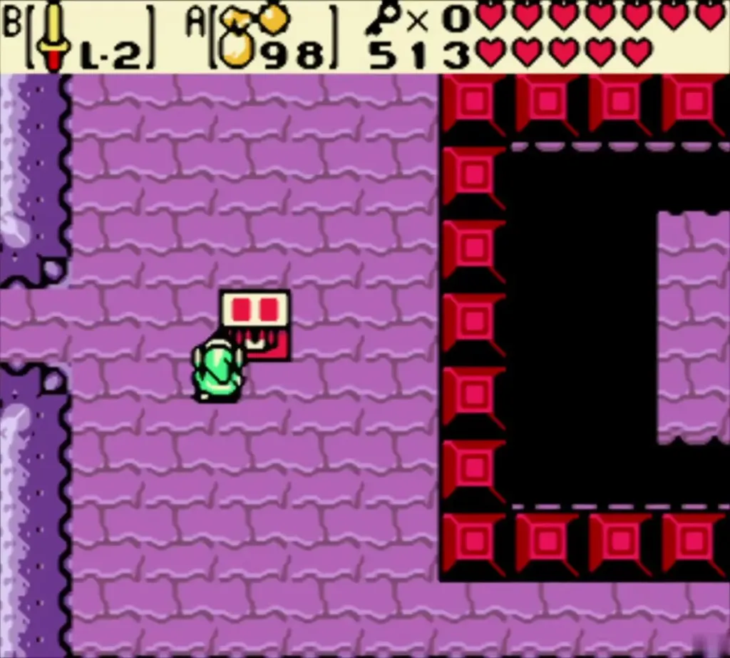 Link beside the chest in the purple room with red blocks, the chest that holds the second Small Key Link beside the chest in the purple room with red blocks, the chest that holds the second Small Key