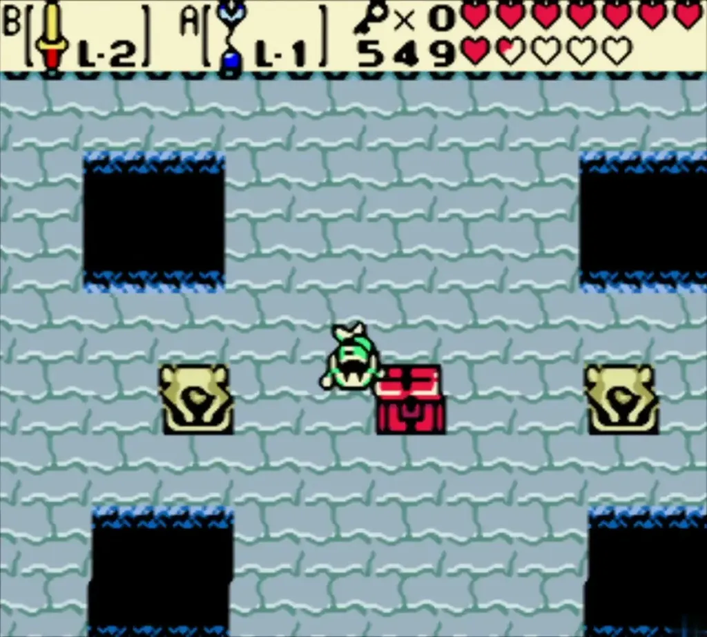 Red chest among four statue tiles in a blue-grey room of Mermaid's Cave Red chest among four statue tiles in a blue-grey room of Mermaid's Cave