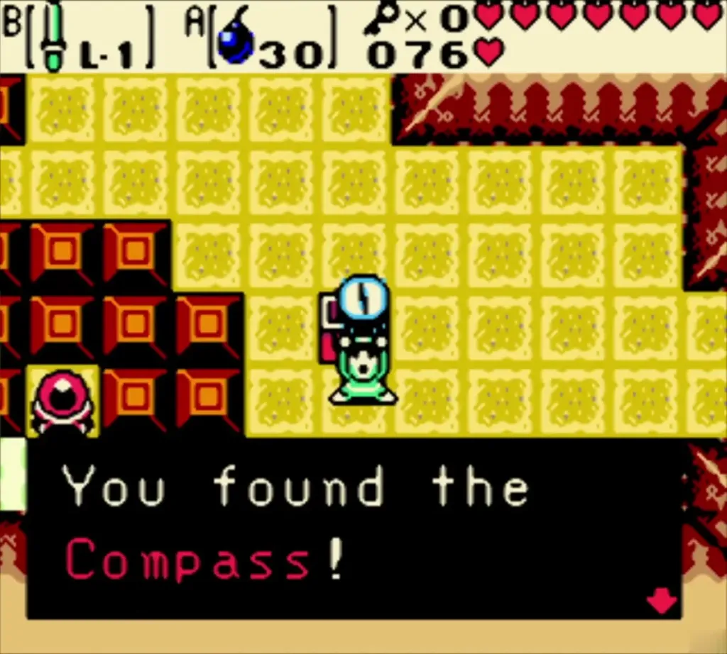 Link holding up the Compass with the You found the Compass message shown Link holding up the Compass with the You found the Compass message shown