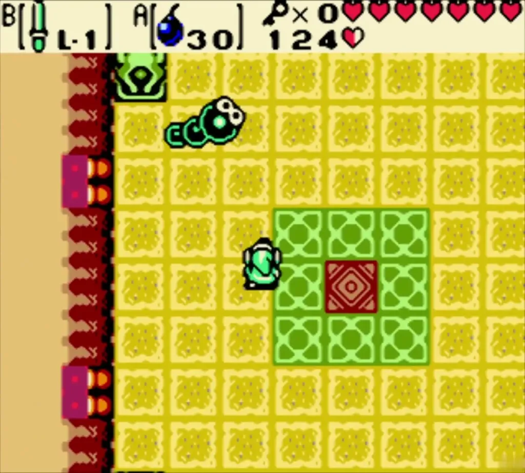 Link walking toward the red diamond floor switch while a snake moves above Link walking toward the red diamond floor switch while a snake moves above