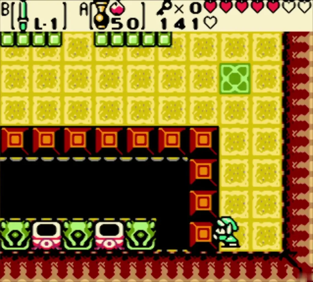 Link beside the pit with two unlit torches below the row of blocks Link beside the pit with two unlit torches below the row of blocks