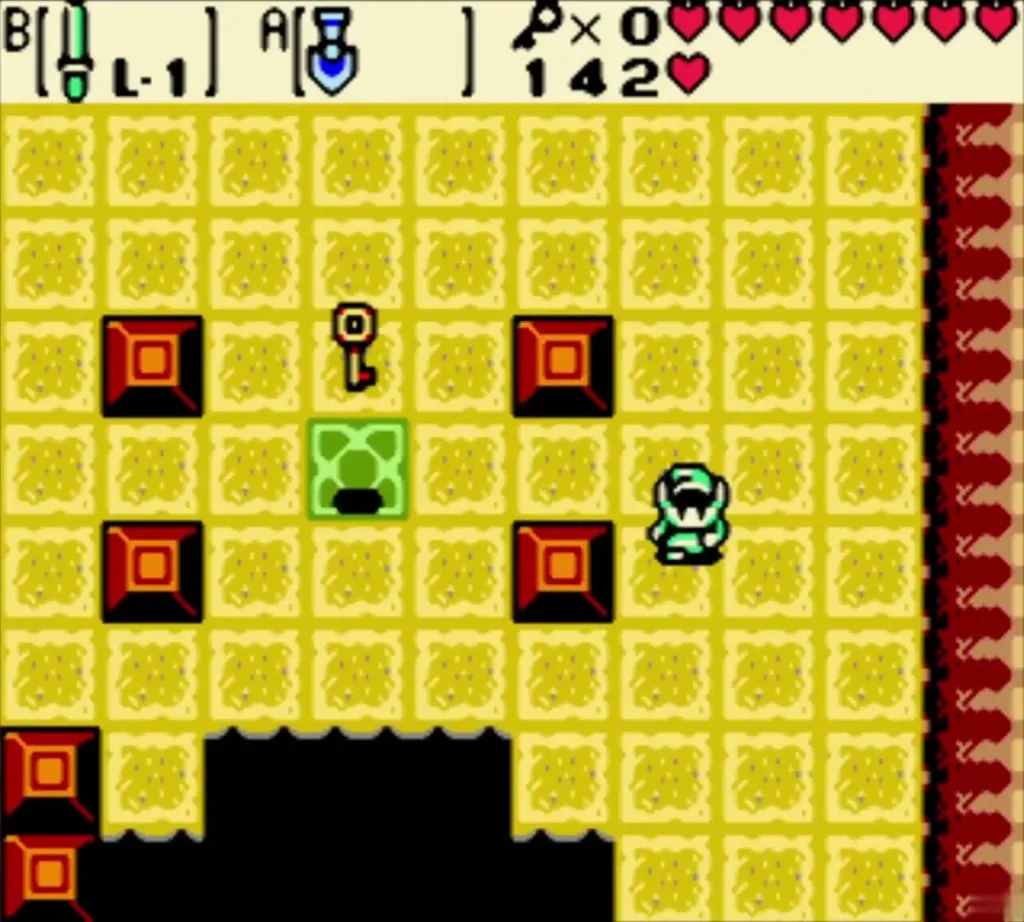The fourth Small Key lying on the green panel between the blocks The fourth Small Key lying on the green panel between the blocks