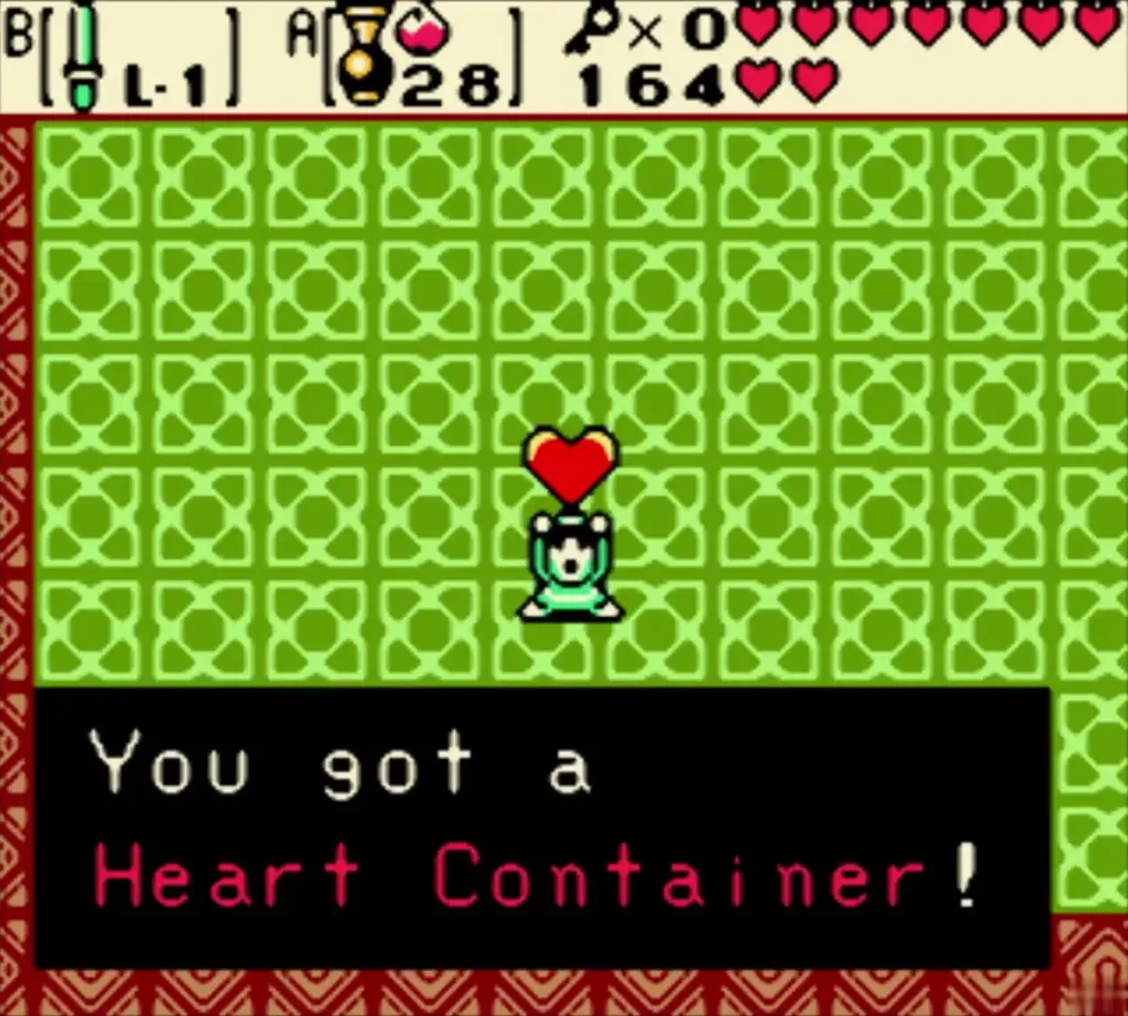 Link holding up the Heart Container with the You got a Heart Container message shown Link holding up the Heart Container with the You got a Heart Container message shown