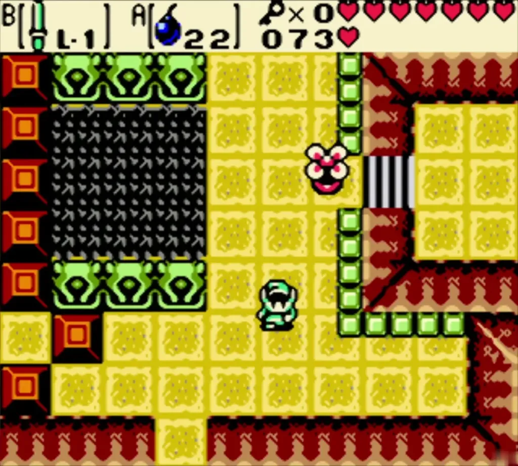 Link beside the pit with green frames while a Peahat hovers nearby Link beside the pit with green frames while a Peahat hovers nearby