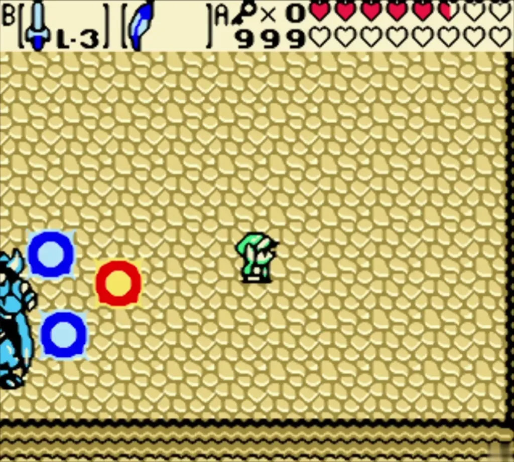 Ganon at the edge of the sand room firing blue and red energy rings Ganon at the edge of the sand room firing blue and red energy rings