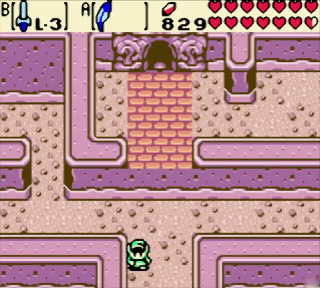 Link in the lower pink maze with the brick doorway ahead Link in the lower pink maze with the brick doorway ahead