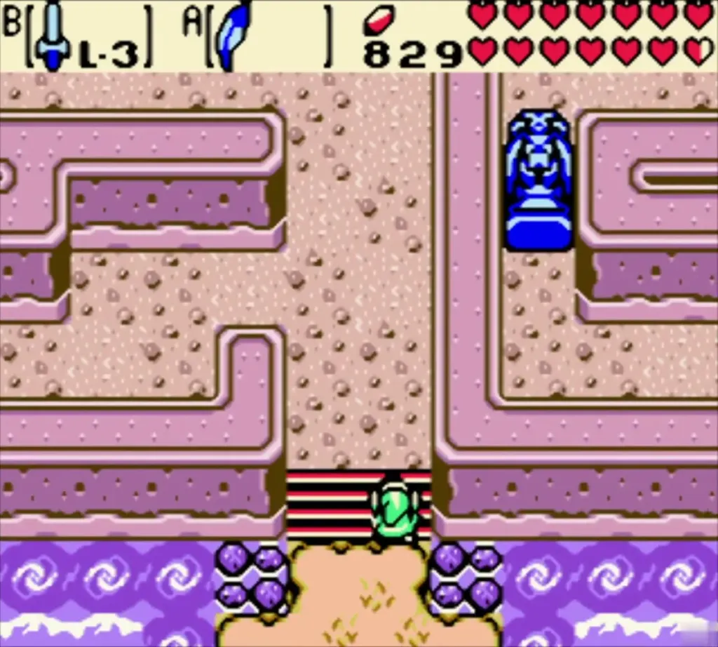 Pink maze entrance with a blue statue at the top right Pink maze entrance with a blue statue at the top right