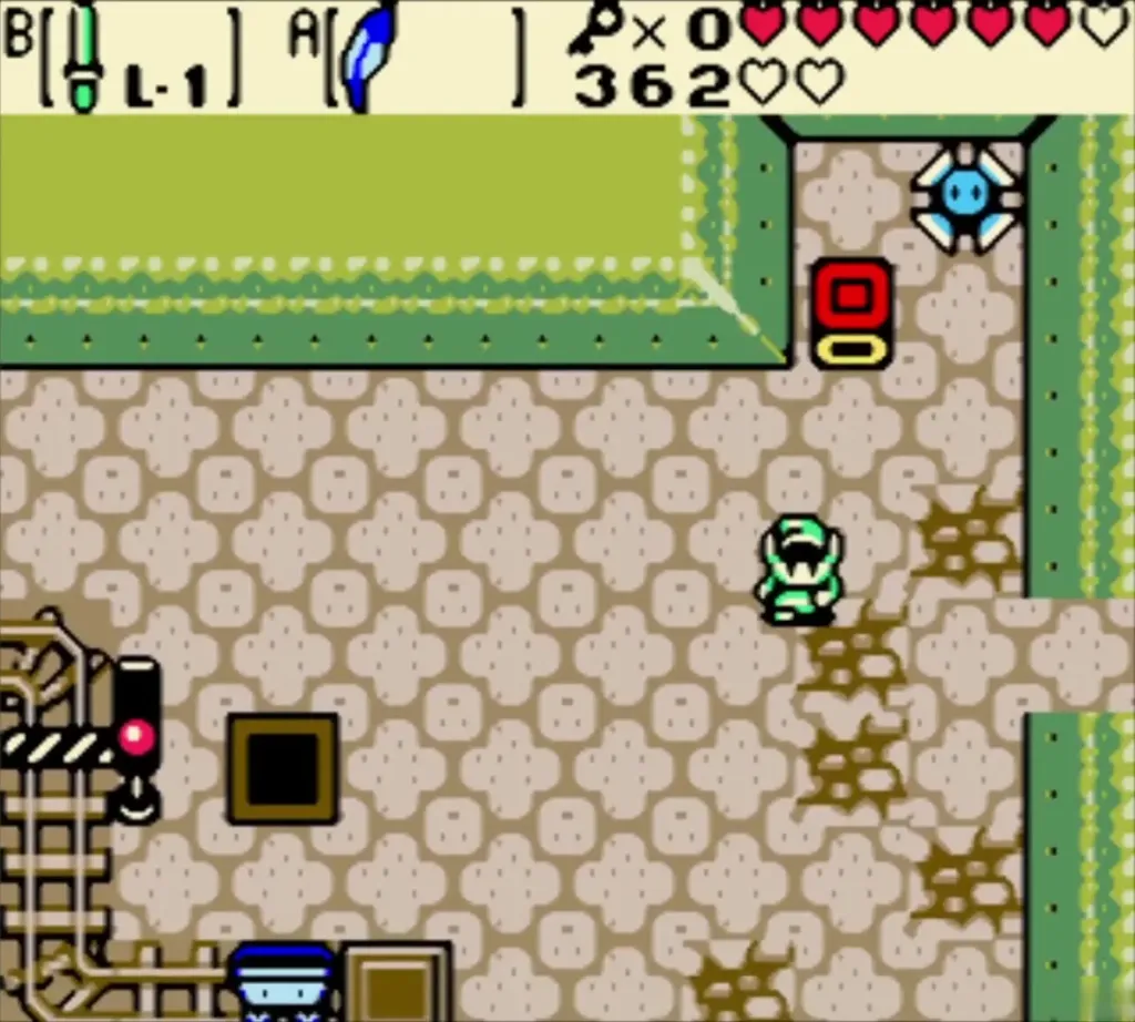 Link in the block room with a Blade Trap at the top and a cracked floor Link in the block room with a Blade Trap at the top and a cracked floor