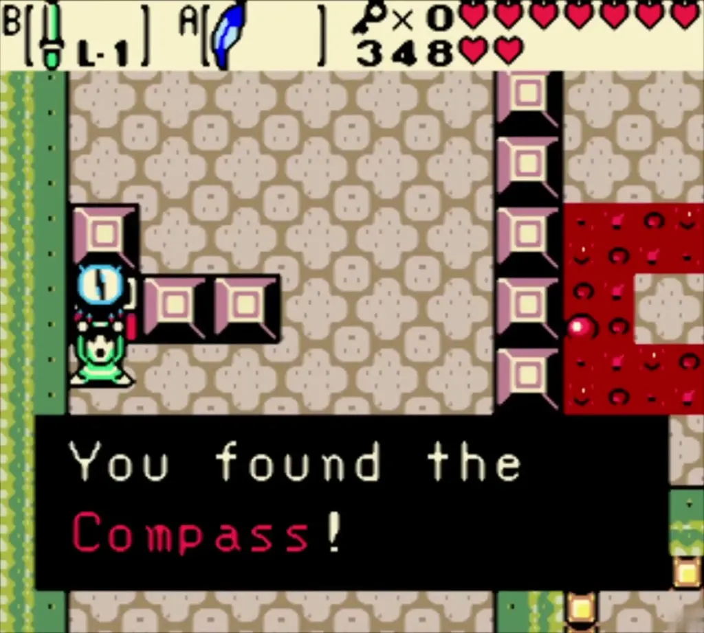 Link holding up the Compass with its message box Link holding up the Compass with its message box
