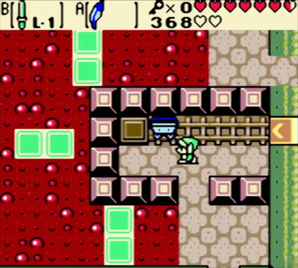 Link beside the waiting minecart on the track platform Link beside the waiting minecart on the track platform