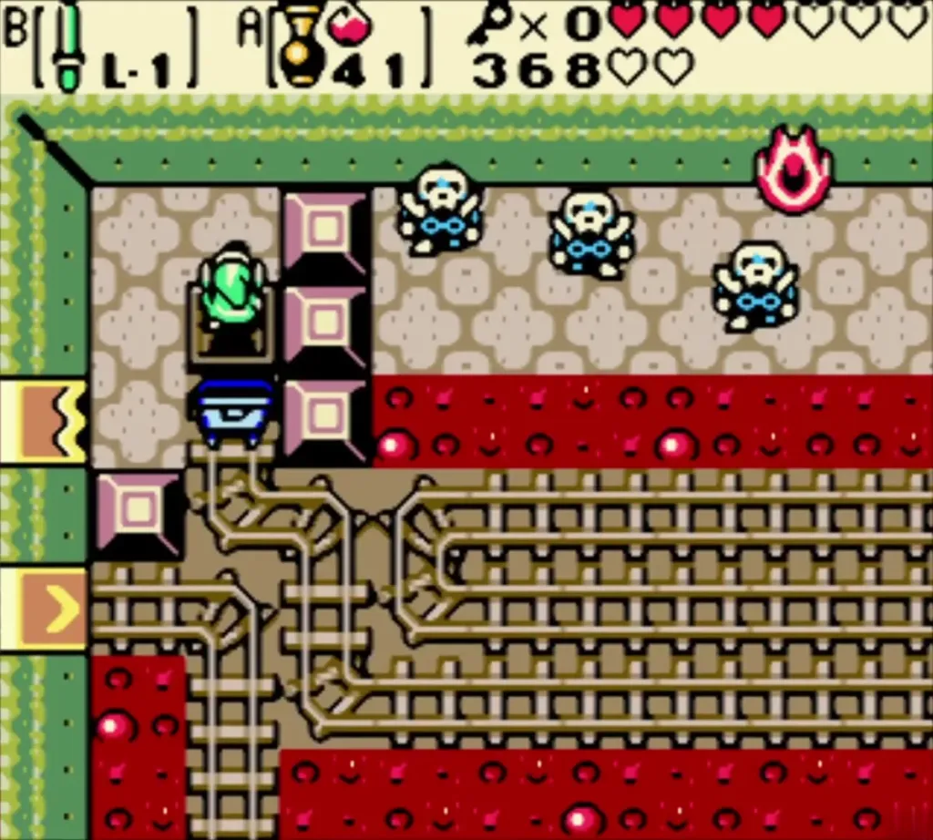 Link in the cart below three Stalfos and a fire bat at the top of the room Link in the cart below three Stalfos and a fire bat at the top of the room