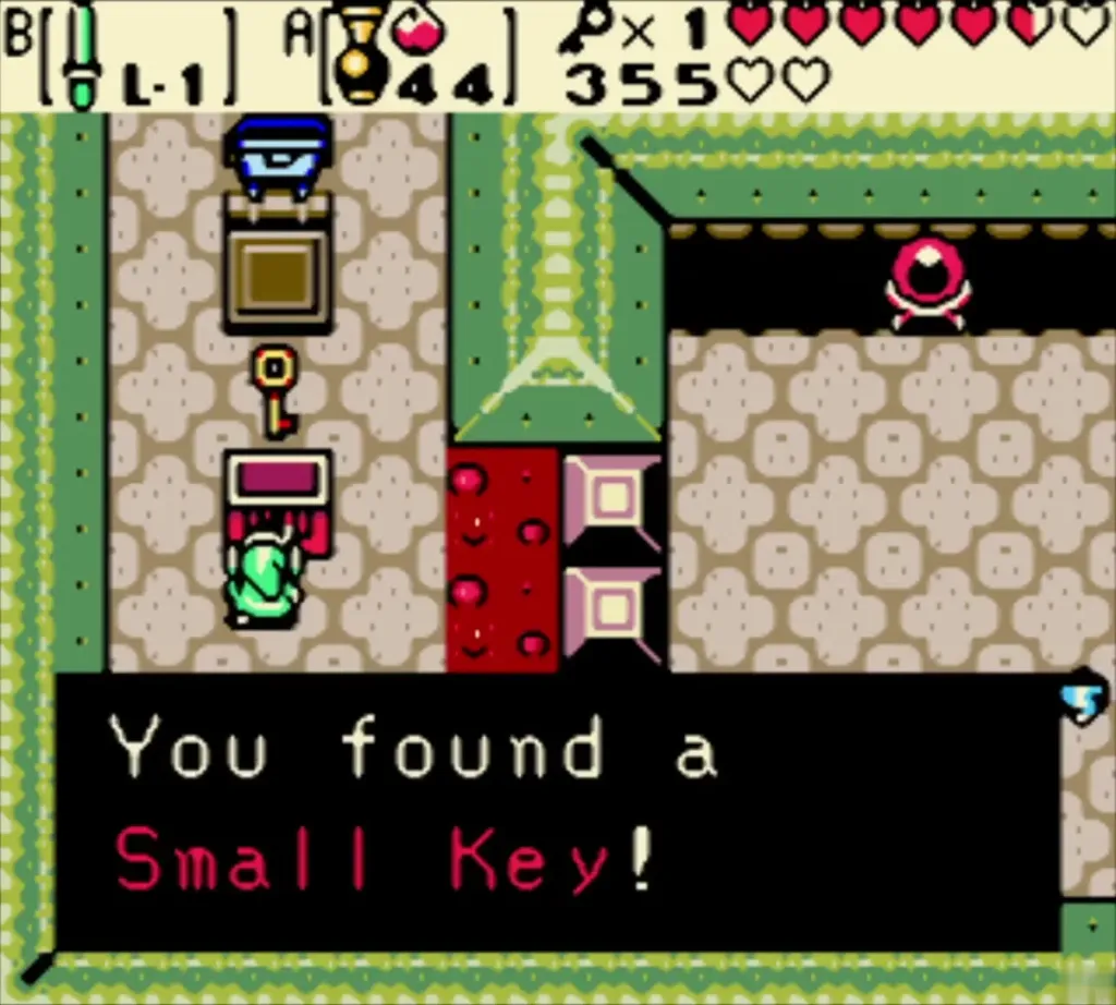 Link holding up Small Key 2 with its message box Link holding up Small Key 2 with its message box