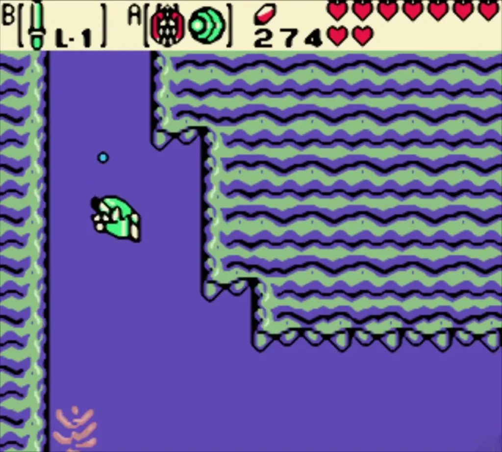 Link swimming underwater beside the rock wall Link swimming underwater beside the rock wall