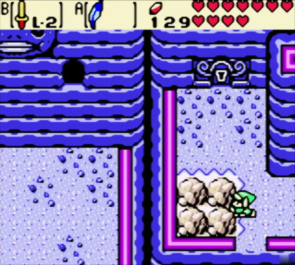 Link beside the boulders below the keyhole door on the ledge Link beside the boulders below the keyhole door on the ledge