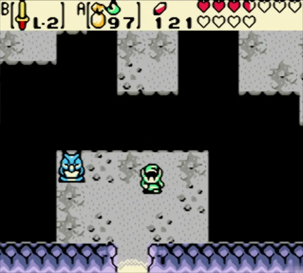 Link walking away from the owl statue toward the cave exit Link walking away from the owl statue toward the cave exit