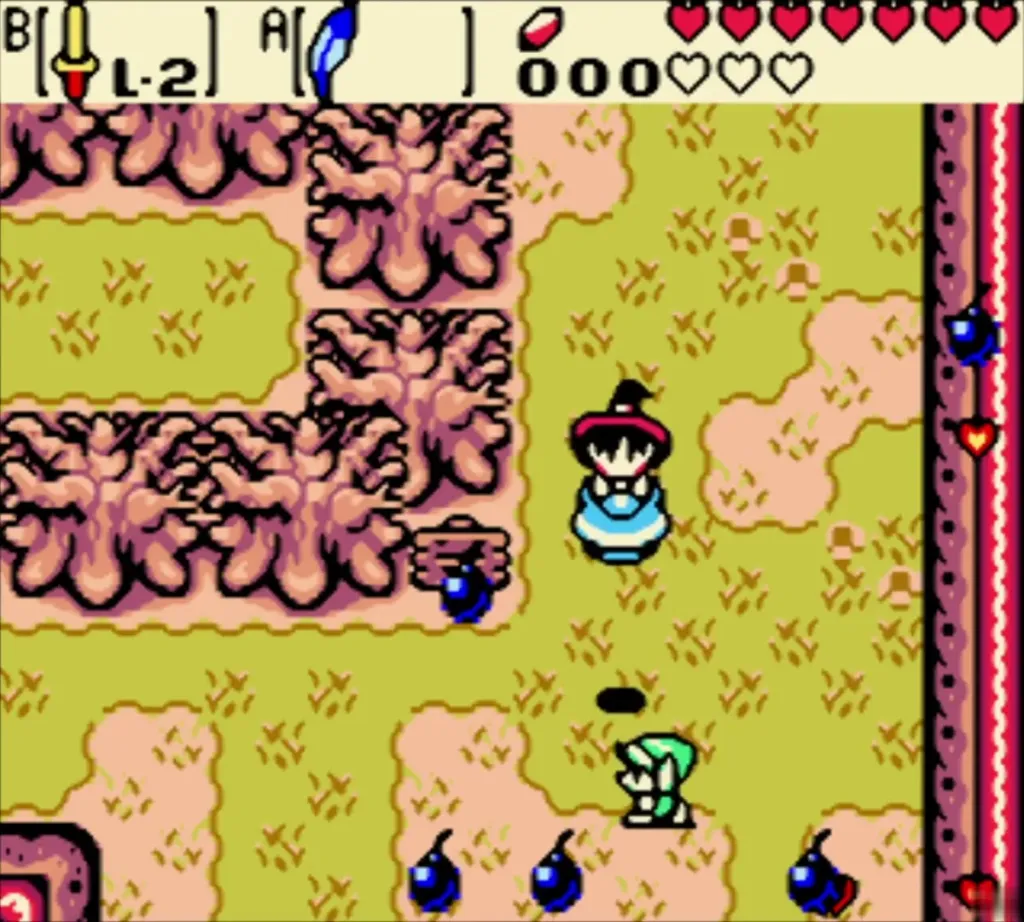 Maple hovering above the scattered bombs in the grass while Link waits at the right edge. Maple hovering above the scattered bombs in the grass while Link waits at the right edge.