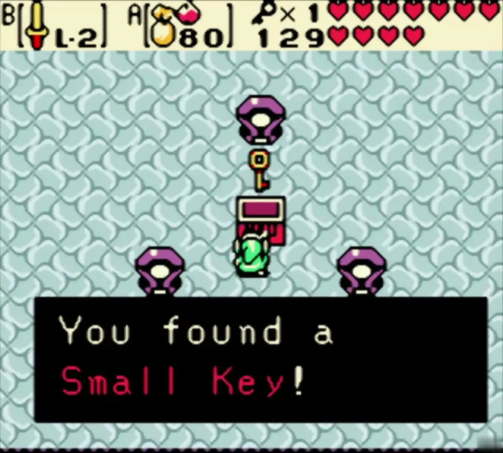 Link holding up the first Small Key with the item message Link holding up the first Small Key with the item message
