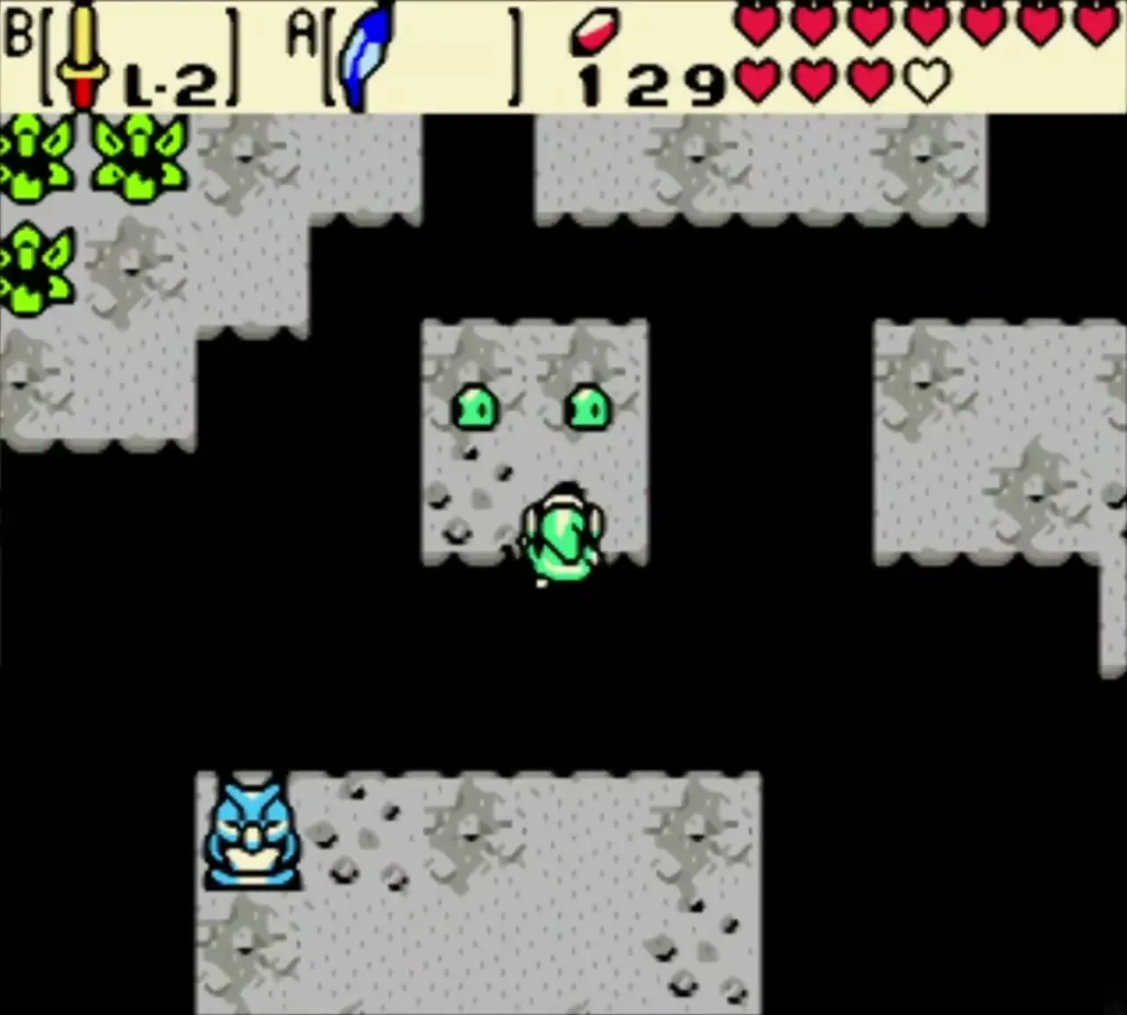 Link on the far platform of the first room with two green Zols Link on the far platform of the first room with two green Zols