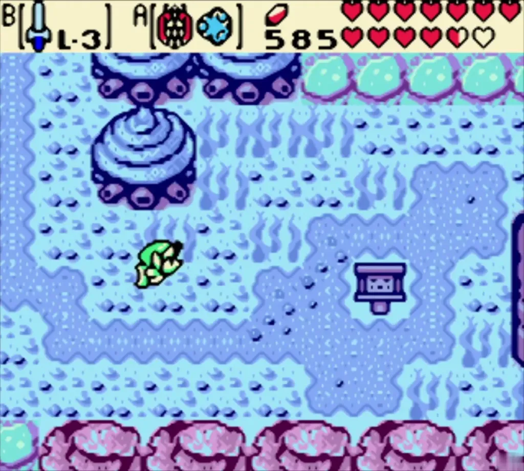 Link swimming in the present sea beside a grey stone block Link swimming in the present sea beside a grey stone block