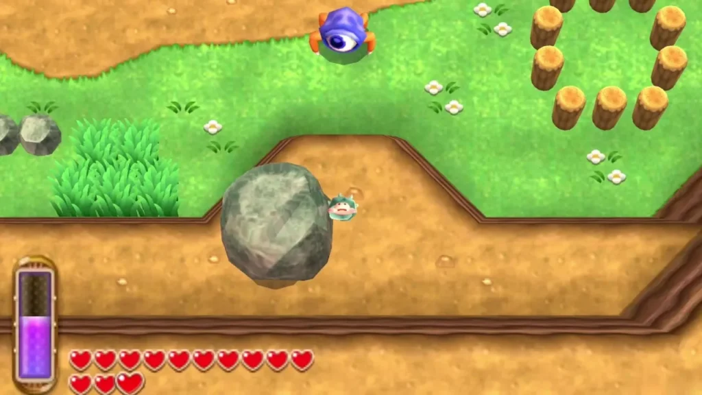 Link carrying a large grey rock on a dirt ledge with the Throw prompt showing, a Maiamai patch beside him Link carrying a large grey rock on a dirt ledge with the Throw prompt showing, a Maiamai patch beside him
