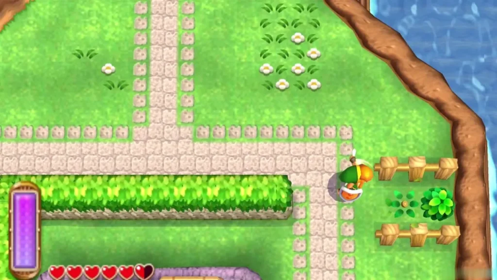 Link by a small fenced patch in Kakariko Village where a bush has been cut, pink cobbled paths behind him Link by a small fenced patch in Kakariko Village where a bush has been cut, pink cobbled paths behind him